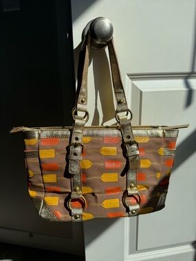 COACH Brown Tote with Orange & Yellow Tag Print and Gold Accents
